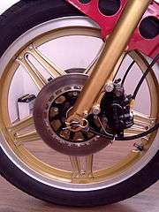Gold reverse Comstar front wheel from a Honda CB400NC