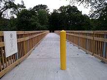 Wooden Bridge with one yellow pole
