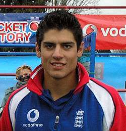 A man wearing England's ODI uniform and looking at the camera