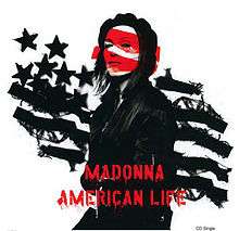 Madonna in a black beret and a black jacket half-open. Over her left face are two lines, painted in red. Behind her, upper left, eight black lines are seen with ten black stars on them.