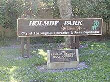 Sign of Holmby Park with a sign of the Armand Hammer Golf Course