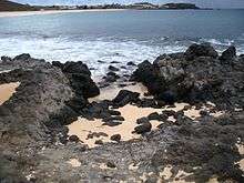 Image of black igneous rocks on the coast of Ascension Island