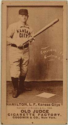 Baseball card picturing a man in a white baseball uniform which reads "KANSAS CITY" on the chest". Below him the card reads "HAMILTON, LF, Kansas Citys".