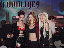 Three young women, dressed as sexy vampires