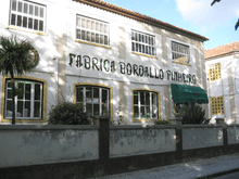 Bordallo Pinheiro ceramics factory. Two stories. Large windows.