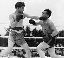 Two Royal Navy men boxing for charity. The modern sport was codified in England.