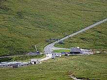 View from Snaefell showing Hailwood's Rise road section ascending diagonally to right in direction of race-travel