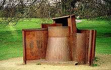 Abstract sculpture made of rusting steel