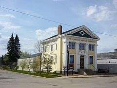 Exterior view of the Bank of Commerce building in Watson