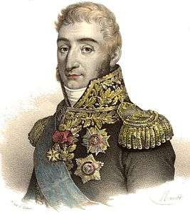 Color print depicts a light-haired man with a long nose and dark eyebrows. He wears a dark uniform liberally sprinkled with gold braid and medals.