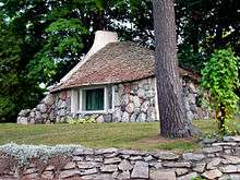 Irregular stone house in Charlevoix, Michigan