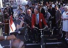 Former Mayor Richard J. Daley riding a Schwinn tandem with cycling advocate Keith Kingbay at the opening celebration of Clark Street bike lane.