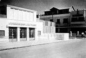 Black-and-white photo of the exterior of a theater