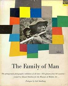 Softcover book catalogue of The Family of Man, Flute Player photo by Eugene Harris.