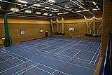 Sports hall, climbing wall, indoor cricket nets from viewing gallery