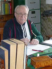 Color photo of Dynkin in his office, circa 2003