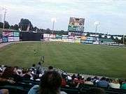 the outfield of Five County Stadium during a game