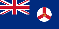 A British Blue Ensign (a blue flag with the Union Jack placed at the top left corner) charged with the badge of Singapore.