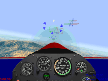 A first-person cockpit view of a simulated airplane; dials and gauges take up the bottom half of the image. The ground and blue sky extend into the distance, and a hill is visible below. Rings of geometric shapes and a wireframe airplane model are in the sky ahead.