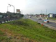 Malinta Exit (KM 15) of North Luzon Expressway in Paso de Blas