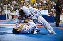 Romulo Barral (bottom) at the World Jiu-Jitsu Championship in Long Beach, California, attempts a triangle choke.