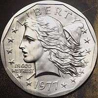 One side of a coin design, depicting the bust of a woman representing Liberty