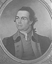 Print of a determined-looking man in a dark military uniform with lighter colored lapels
