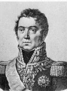 Black and white print of a wavy-haired man in a dark high-collared military coat with epaulettes and much gold braid.