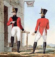 Print depicts two soldiers wearing red coats with black facings, white breeches with black gaiters, and black shakos.