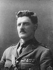 A head and shoulders portrait of a man in military uniform.