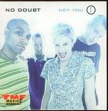 The artwork portrays the four main band members of No Doubt standing in a brightly-lit room.