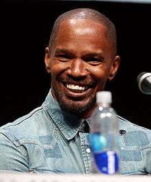 A picture of Jamie Foxx speaking at 2013 San Diego Comic Con.