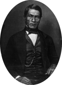 Hawaiian man in western Victorian formal suit