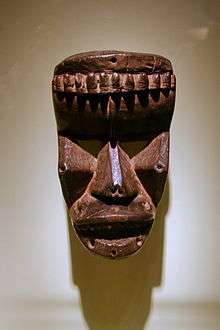 A wood carved, Krahn face mask on display at the National Museum of African Art