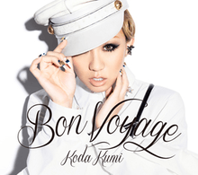 A woman wearing captain attire, with her hand tilting the handing which covers one eye. The words "Bon Voyage" and "Koda Kumi" are superimposed over her.