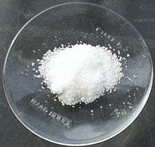 Lithium chloride, in salt form, on a petri dish