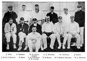 Hesketh-Prichard sits in an official cricket photograph surrounded by his team-mates