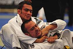 Lucas Leite executing a gi choke on his opponent at the 2009 Pan-American Jiu-Jitsu championship