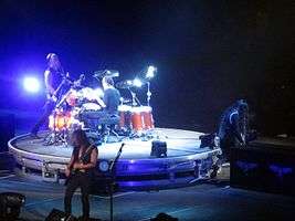 Members of Metallica performing onstage