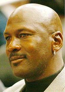 A picture of Michael Jordan wearing an earring.