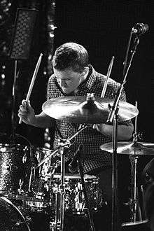 Mike Byrne—a Caucasian male 21 years old drummer in a black and white photo
