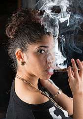 Aerosol (vapor) exhaled by an e-cigarette user using a nicotine-free e-cigarette.