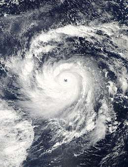 A visible image of Super Typhoon Nida, depicting a symmetrical storm and a clear eye, both of which are hallmarks of a powerful tropical cyclone.