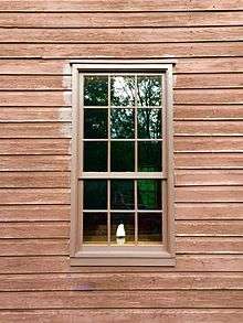 Nine-over-six double-hung sash wooden window
