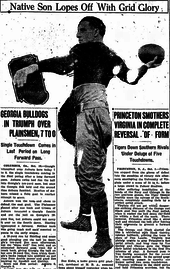 From a newspaper, Kuhn in uniform, throwing a football