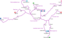In the middle is a purple circle, with several branches sticking out. One line runs north, one line runs to the north-east and one line runs to the north-west. One line runs to the east that branches into three, two heading south and one east, and the final line runs west, with a short stretch branching off running above a short while.