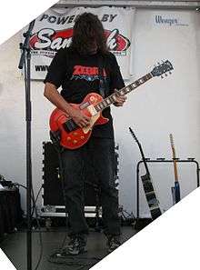 Randy Jackson plays guitar
