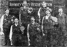Seven rescuers pose in front of the Rhymney Rescue Station.
