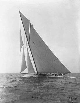 Black and white photograph of the yacht Resolute under full sail
