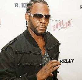A photograph of R. Kelly.